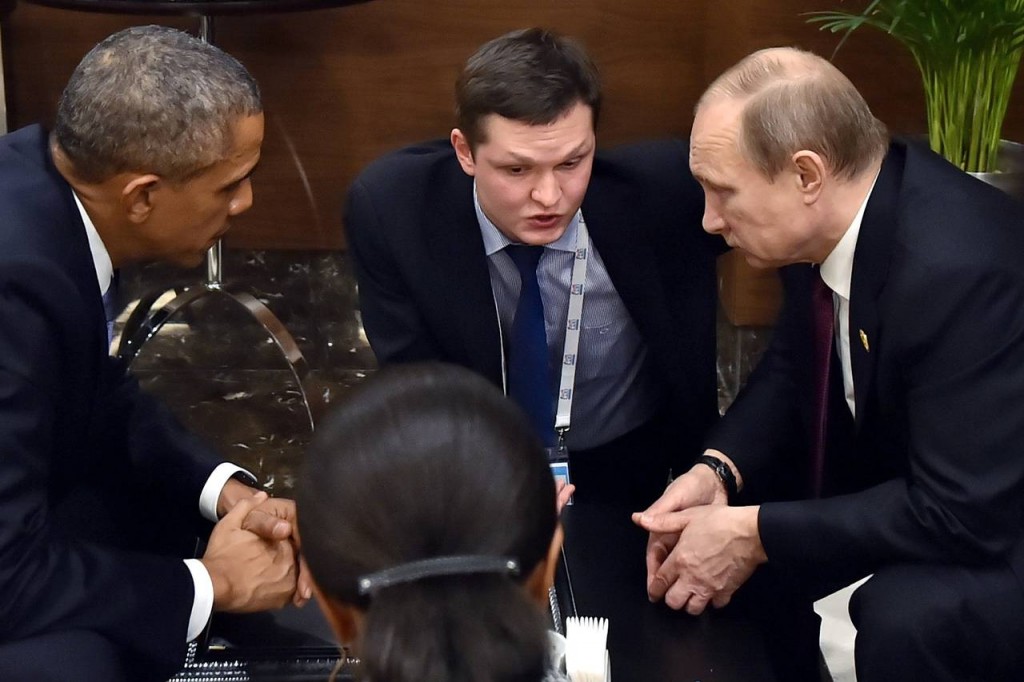 U.S. President Barack Obama speaking with Russian President Vladimir Putin before the opening session of the G-20 summit in Antalya, Turkey, on Sunday. PHOTO: ASSOCIATED PRESS